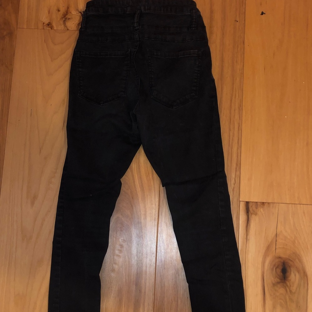 Three button high rise black skinny jeans